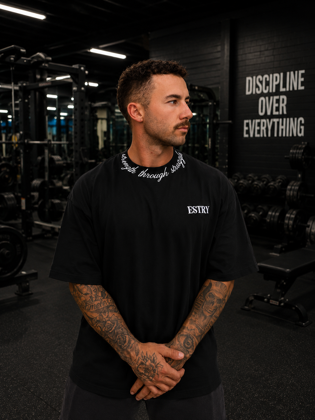 ESTRY STRENGTH THROUGH STRUGGLE TEE — BLACK 001